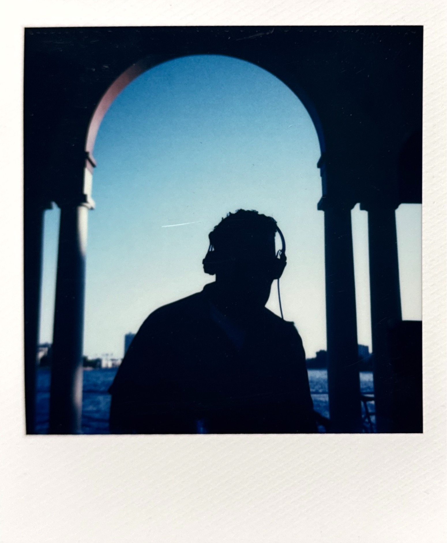 MonkeyMan silhouette by the water